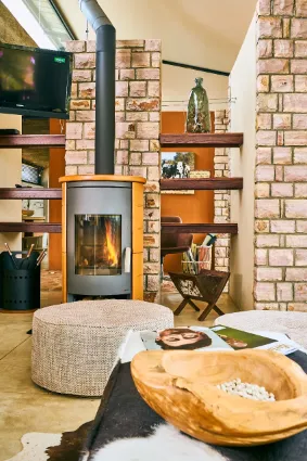 Refined interior styling within the villas, where modern elegance meets the warm, earthy tones of the Namibian Kalahari.