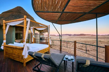 The dedicated open-air sleeping deck, illustrating the lodge’s commitment to providing a profound, unfiltered connection with the night sky.