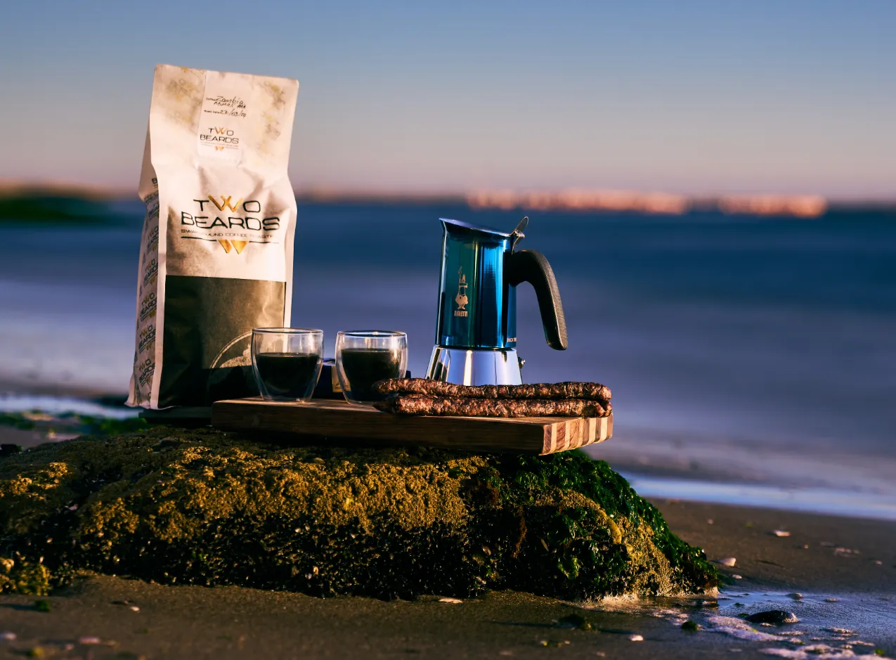 The Two Beards Coffee roastery in Swakopmund, documenting the industrial-artisanal atmosphere where small-batch 100% Arabica beans are meticulously roasted