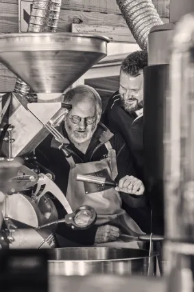 Detail of the roasting process, capturing the precision and expert craftsmanship required to unlock the unique flavour profiles of single-origin beans.
