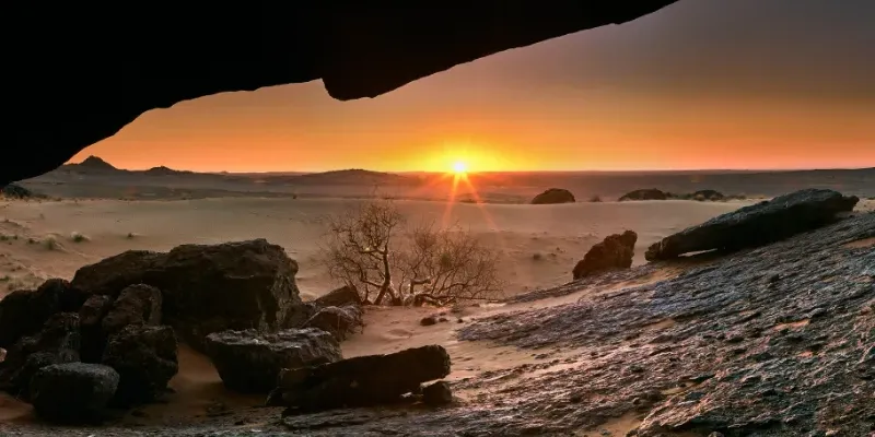 A natural rock arch within the Hartman's Valley, representing the remote and ancient destinations of our bespoke African expeditions.
