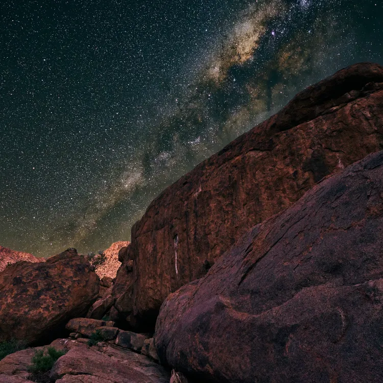 A celestial study of the Milky Way above Sondersib, illustrating the pristine and unfiltered night skies of the Namib desert.