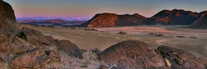 Dusk over the Hartmann Valley, where the soft evening light defines the rhythmic contours of the remote northern dunes.